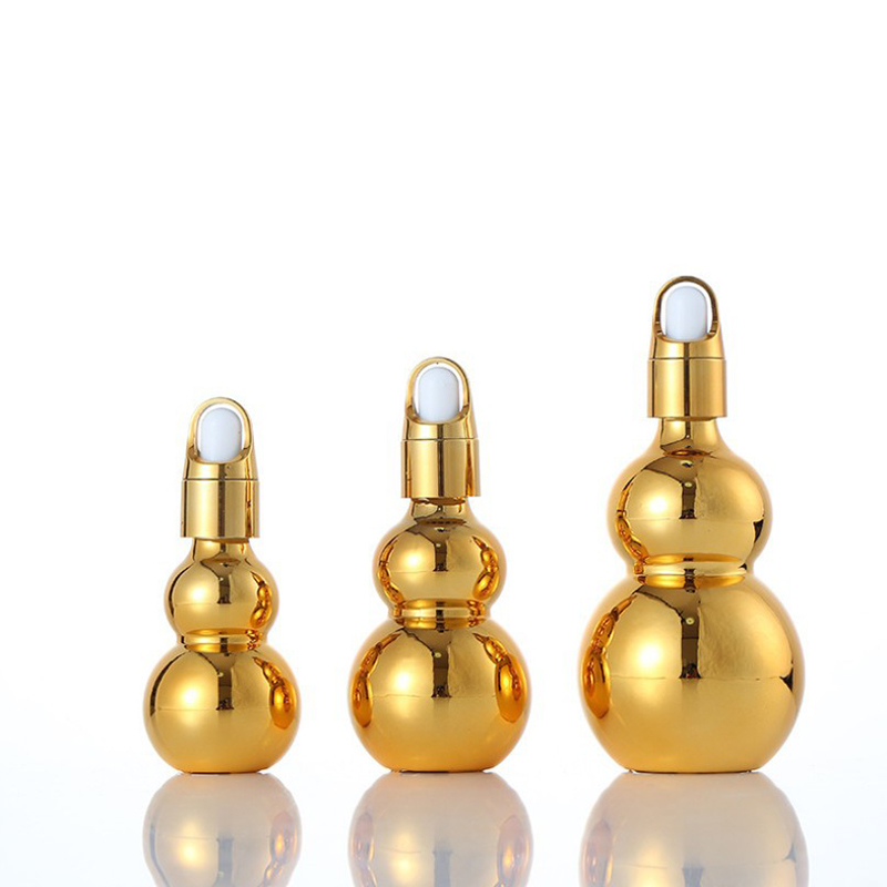 Luxury Gold-Plated Essential Oil Bottle — Elegant & Functional Glass Dropper Bottle for Premium Skincare (2)